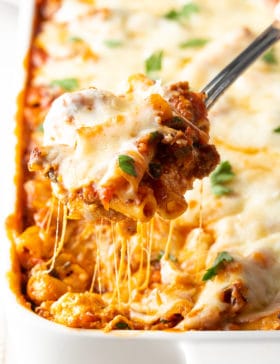 Ricotta Baked Ziti with Sausage Recipe #ASpicyPerspective #baked #ziti #noboil #ricotta #pasta #italian #comfortfood #slowcooker #crockpot