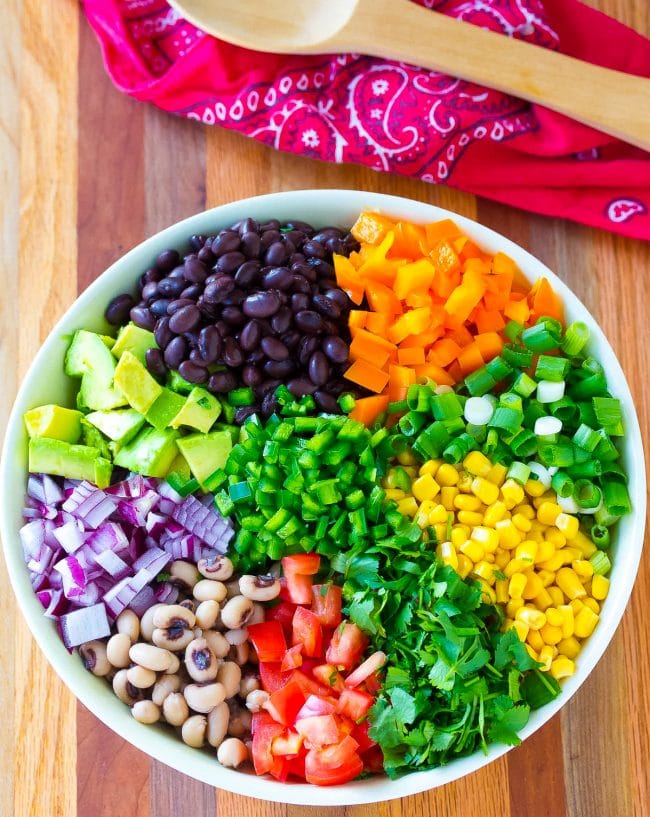 Bowl filled with ingredients for cowboy caviar.