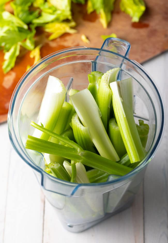 Celery stalks in a blender.