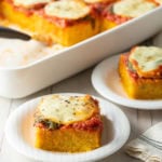 Margherita Baked Polenta Recipe #ASpicyPerspective #polenta #italian #glutenfree #margherita #marinara #pesto #basil #mozzarella