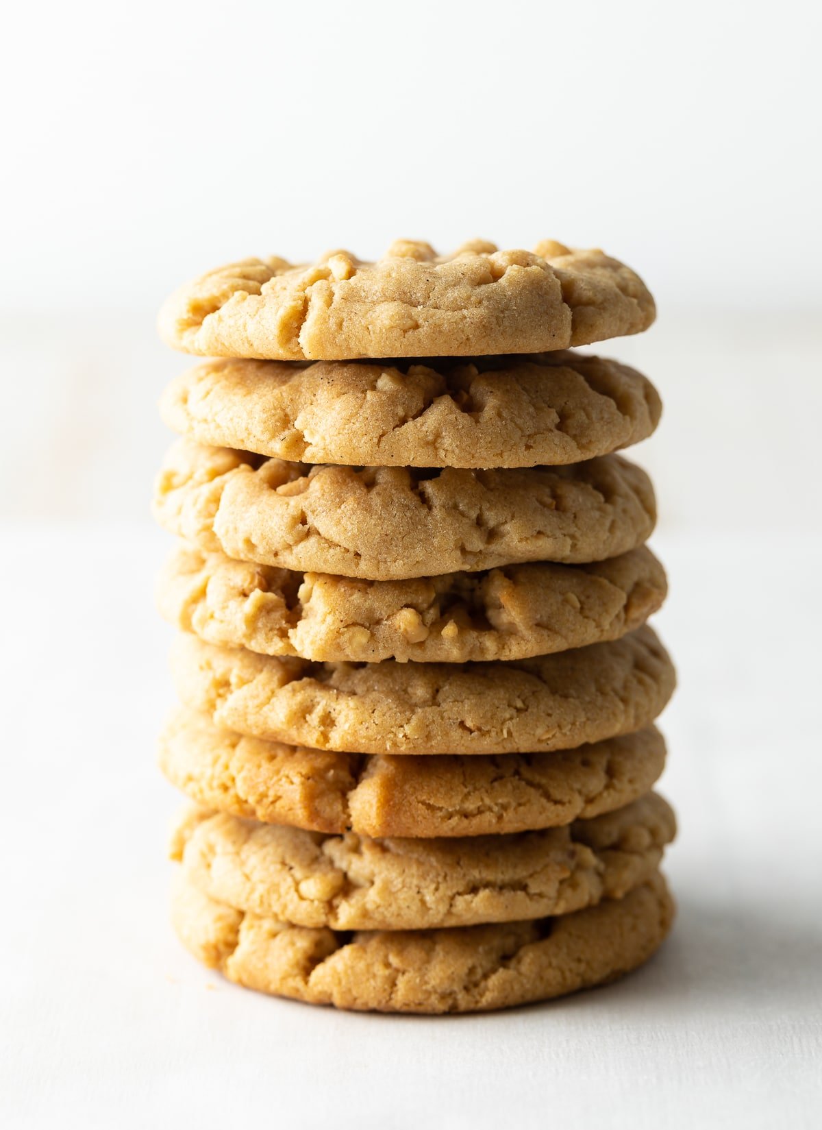 Soft Peanut Butter Cookies with Peanuts - one stack of cookies with white background