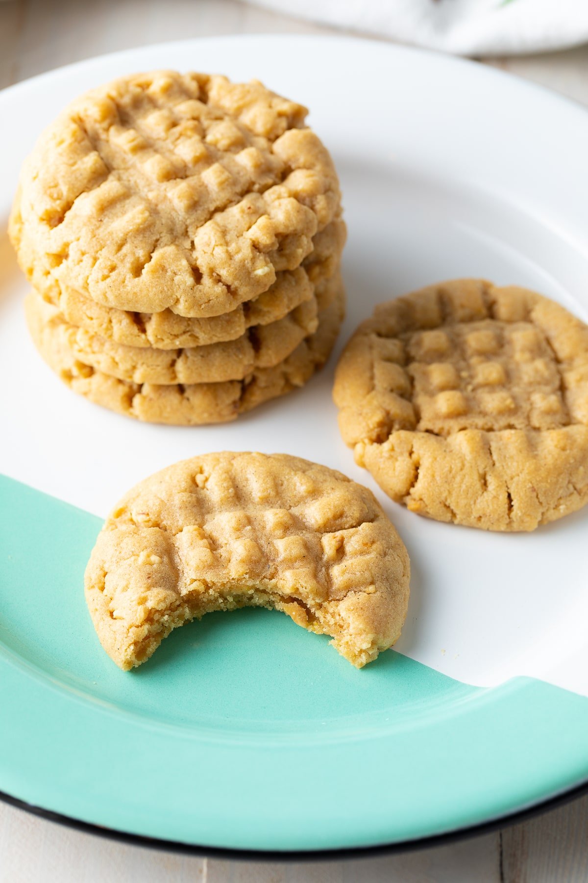 irresistible cookies stacked on plate - close up shot