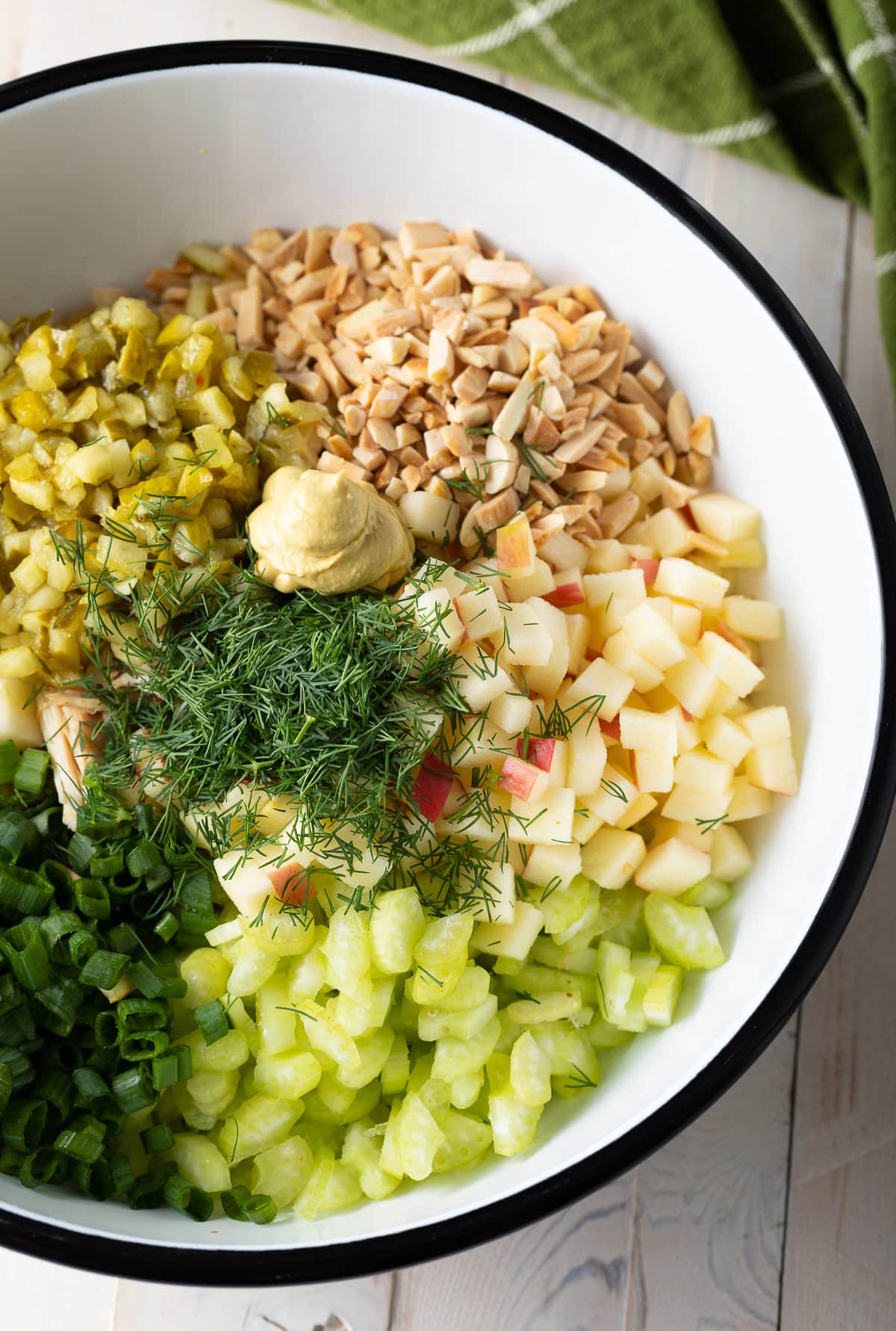 Ingredients for chicken salad in a bowl. 