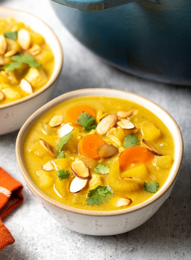 Serving of this healthy chicken curry soup recipe in a bowl
