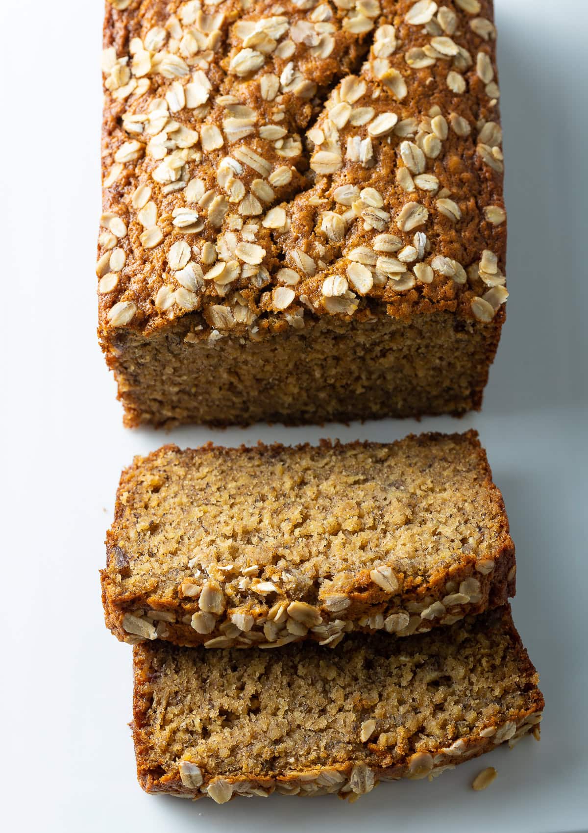 Oatmeal Banana Bread with two slices off the end.
