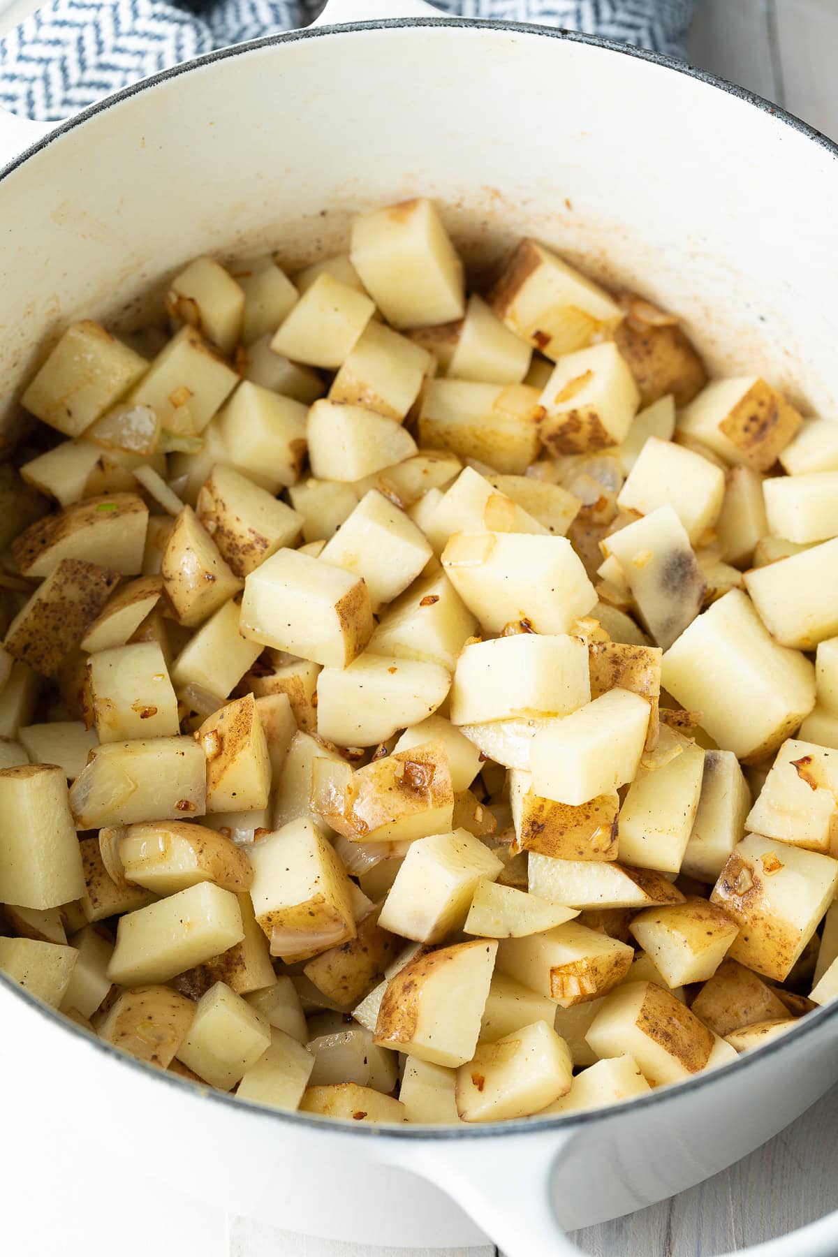 raw potatoes in large pot for soup