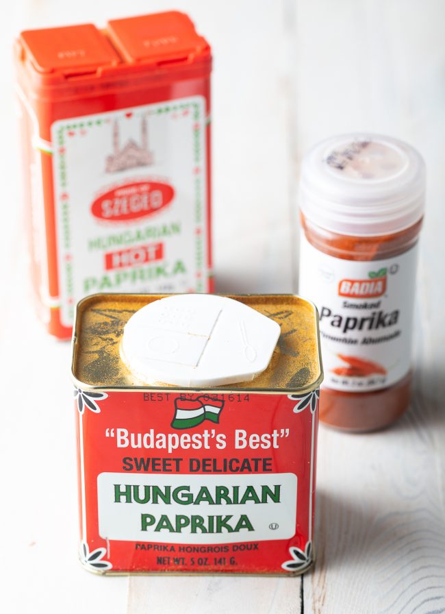 A few of the spices needed for this recipe including hungarian paprika 
