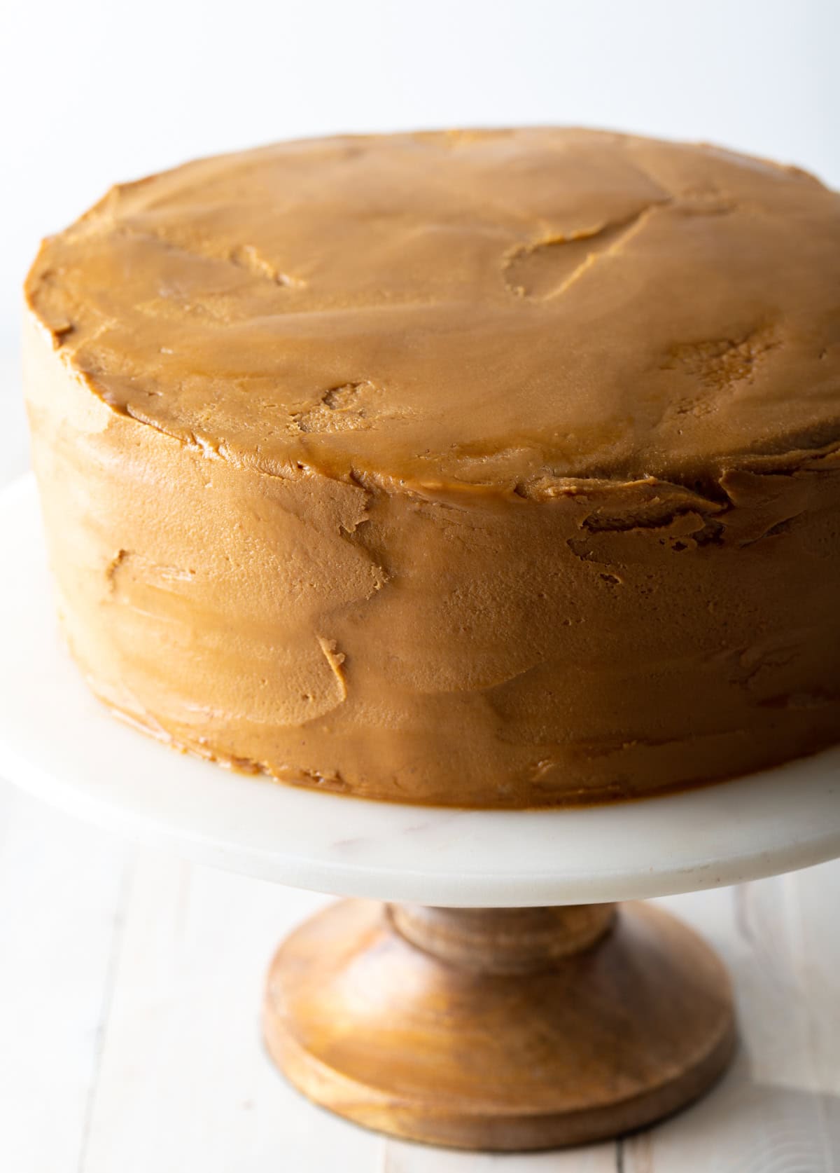 seven layer caramel cake on cake stand