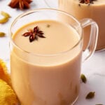 Graphic with text how to make Indian chai tea with photo of tea in a clear mug.