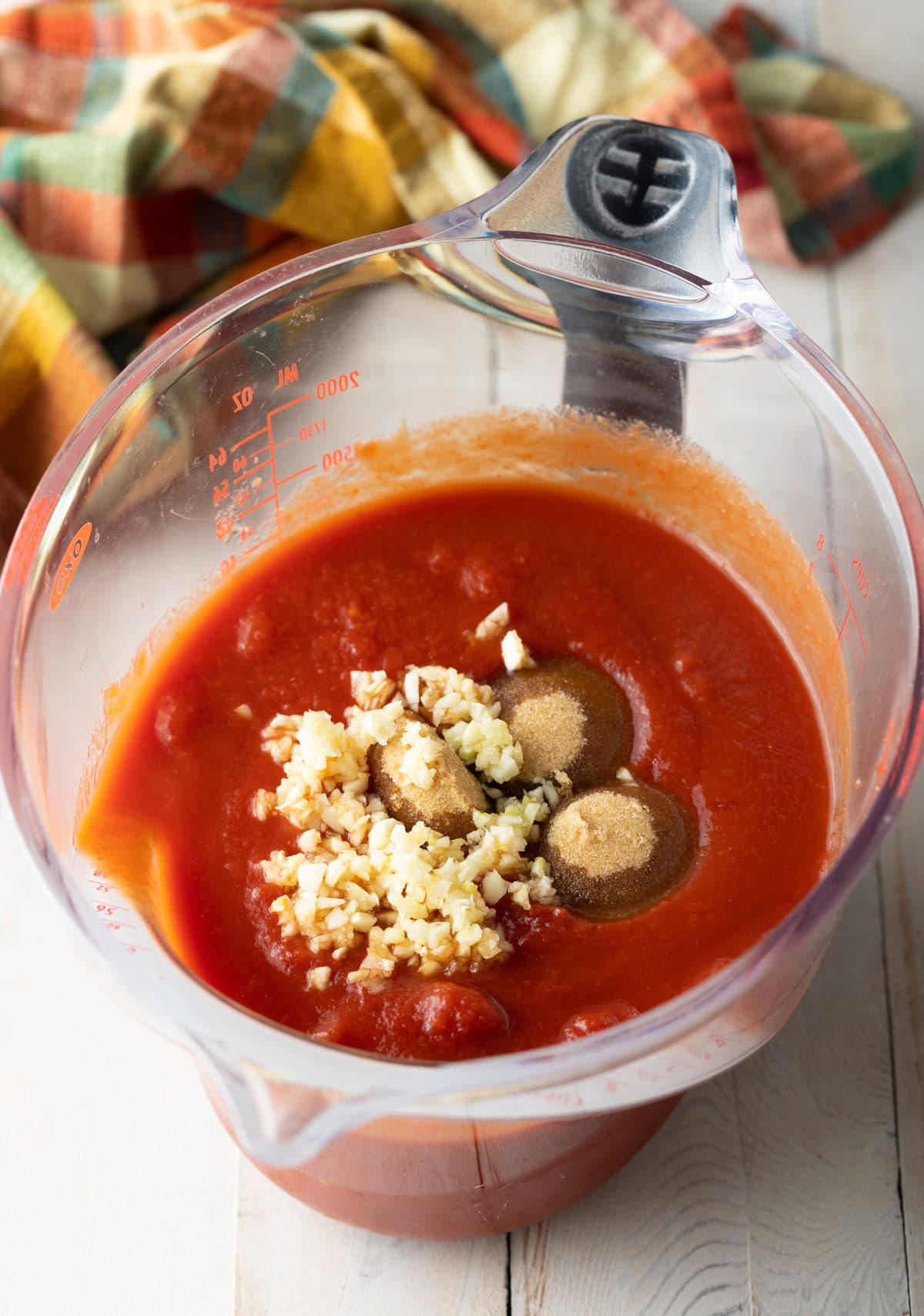 Bowl filled with tomato sauce for cabbage rolls.