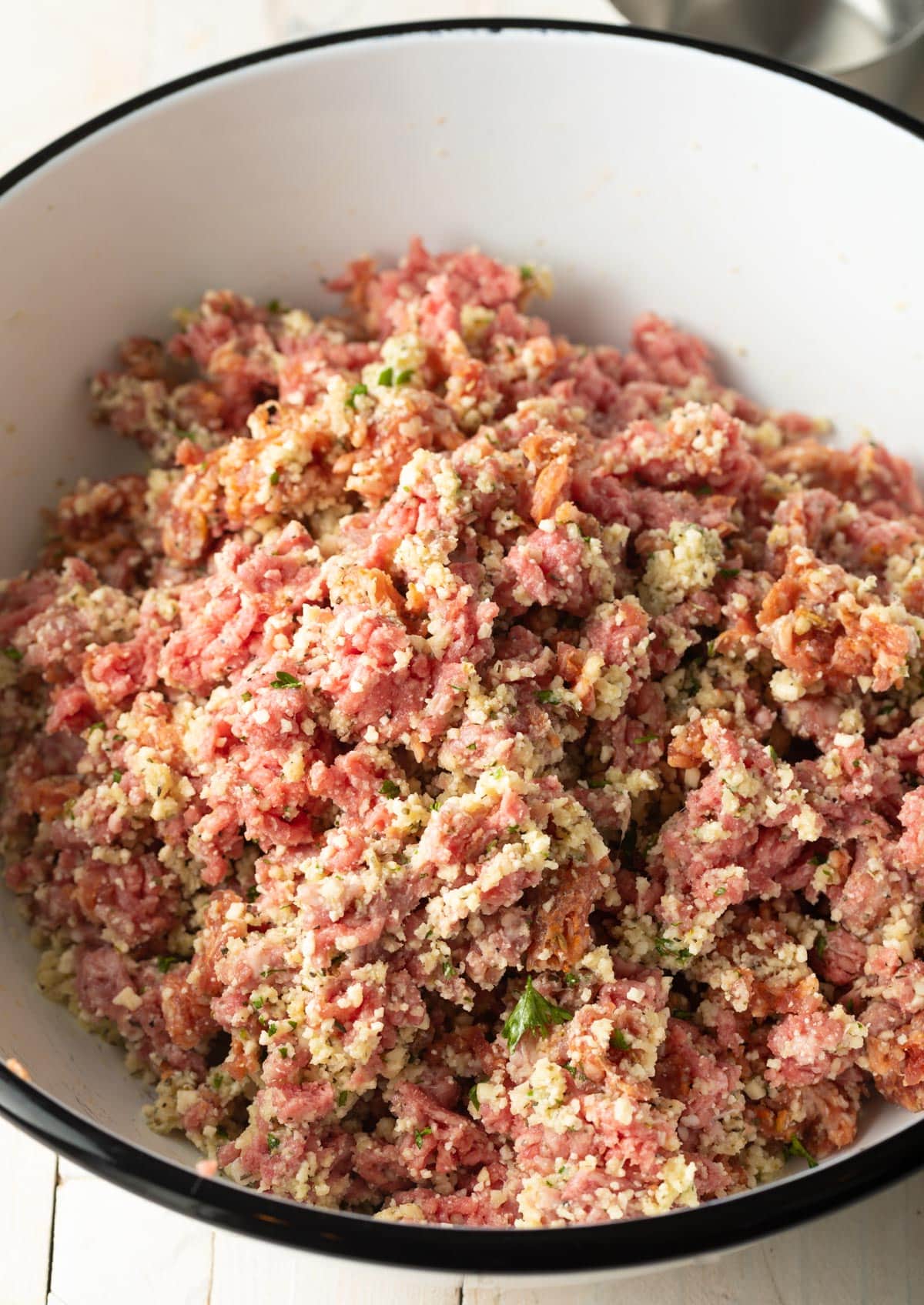 ground beef, pork, and veal with seasonings