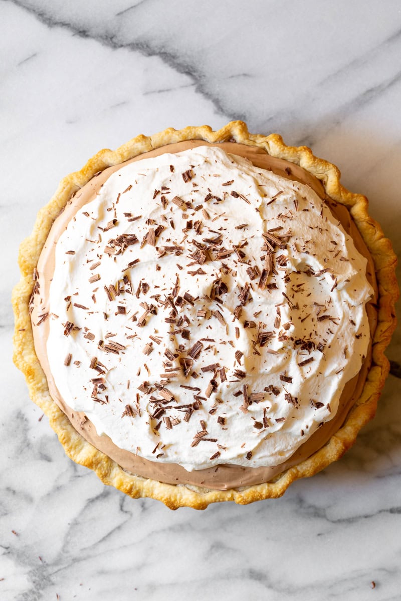 Overhead of full Chocolate Silk Pie with whipped cream