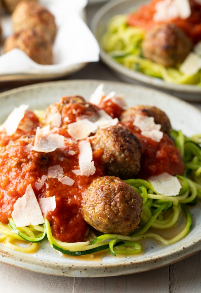 healthy oven baked turkey meatballs with zoodles and tomato sauce