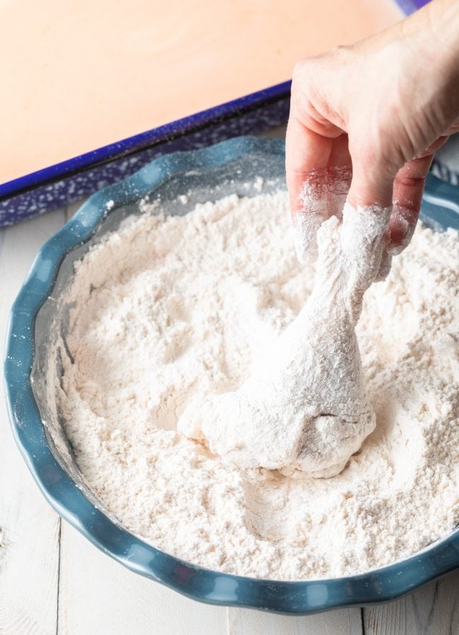coat chicken in flour mixture