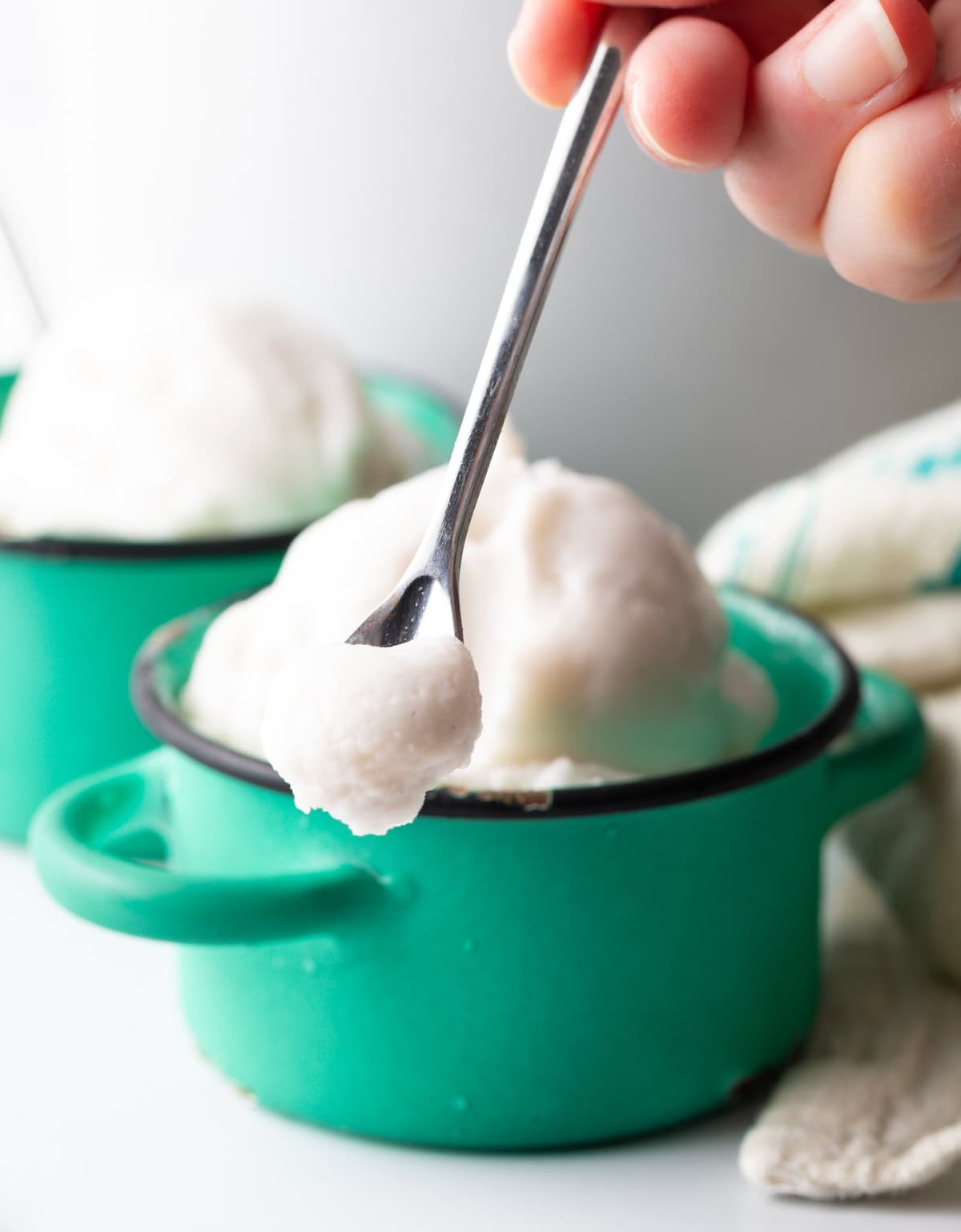 scoop of coconut ice cream on a spoon