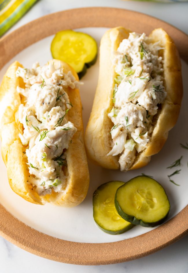 sandwiches made with seafood in a creamy dressing