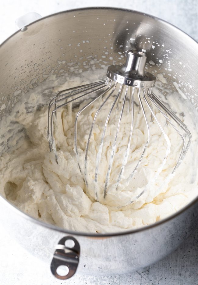 whipped cream with a large wire whisk in a standing mixer