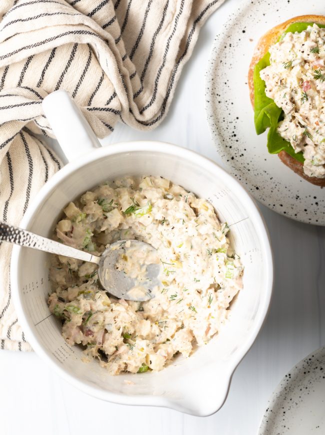 bowl of tuna salad overhead with spoon