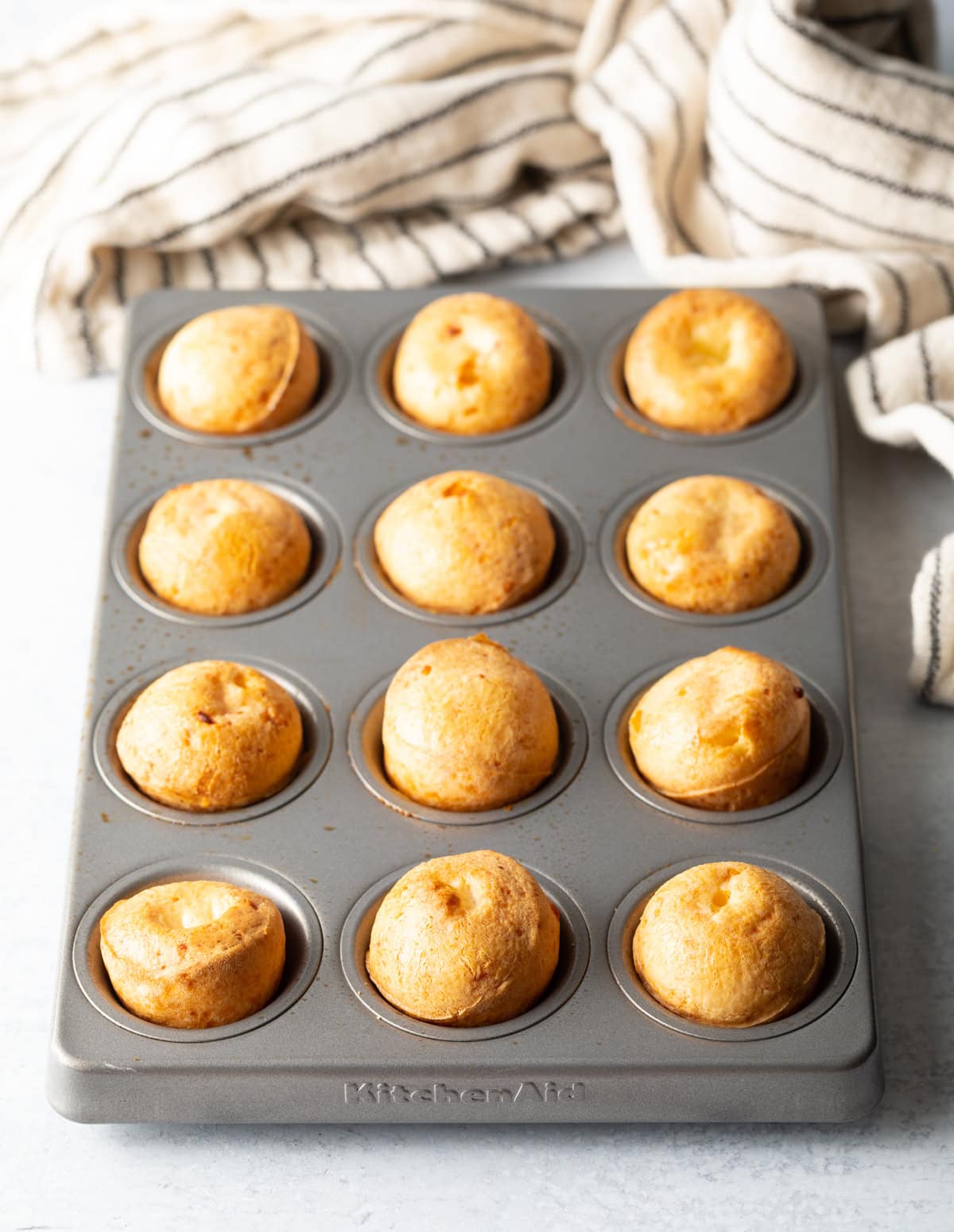 puffed pao de queijo in the muffin tin