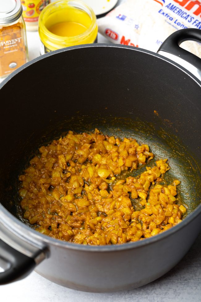 pot with minced garlic and seasonings