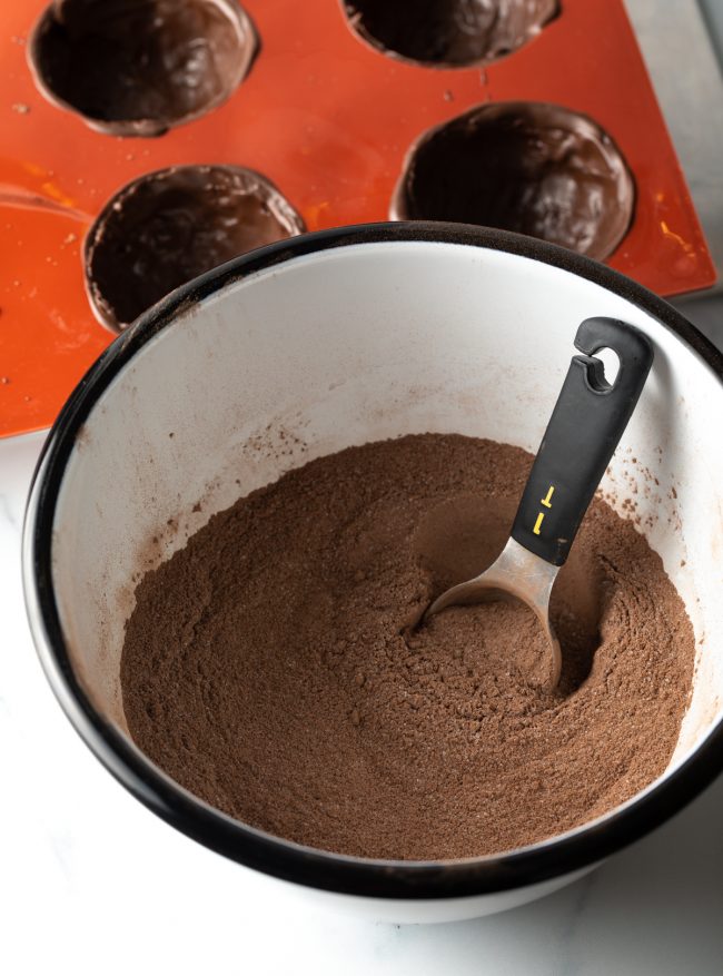bowl with mixtures of cocoa powder and spices
