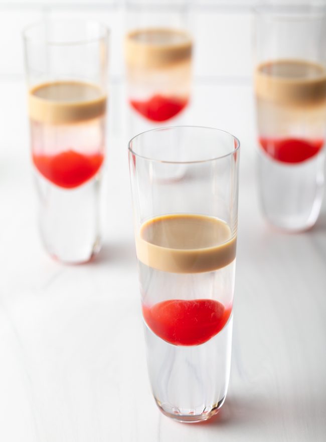 slippery nipple cocktails in shot glasses with three layers