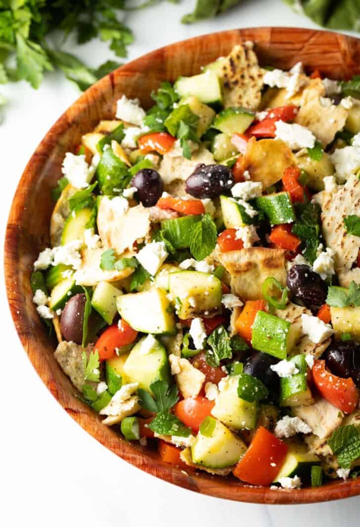 Meditteranean Grilled Vegetable Salad top down view, a bowl arranged with grilled veggies and feta cheese.