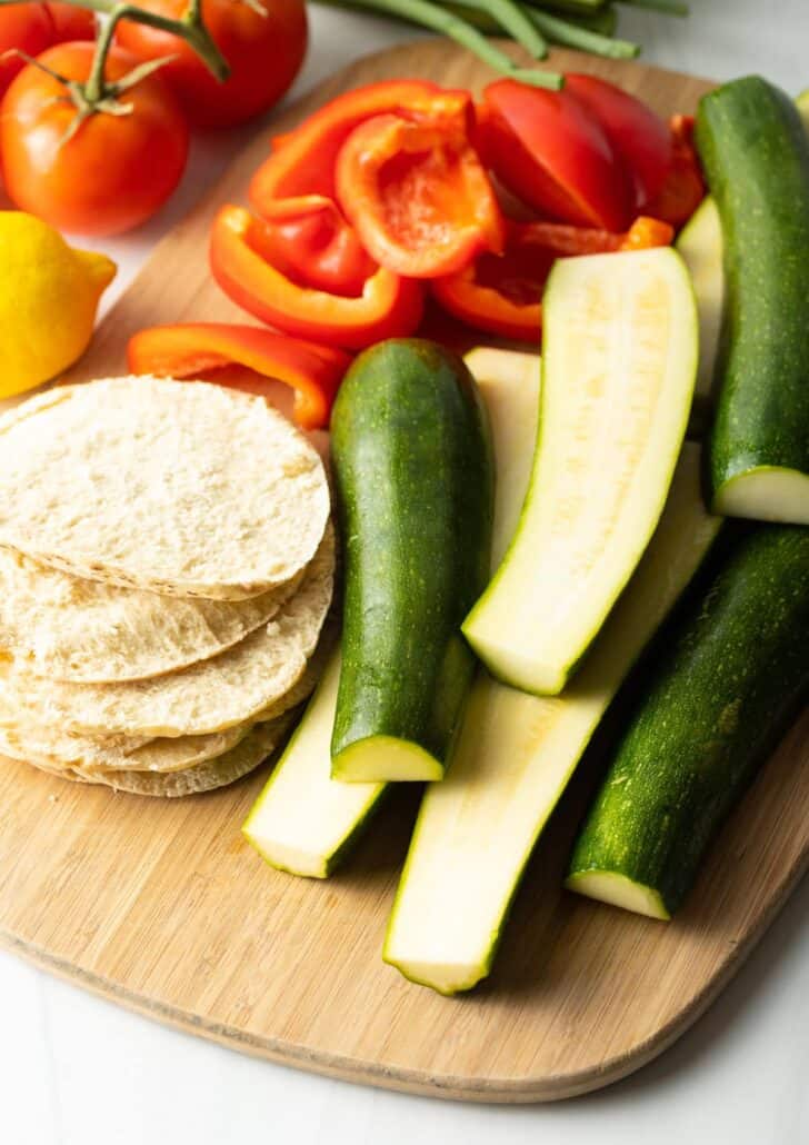 chopped vegetables and pitas