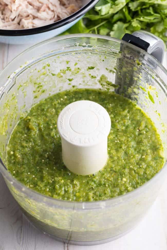 Blended salsa verde in a food processor. 
