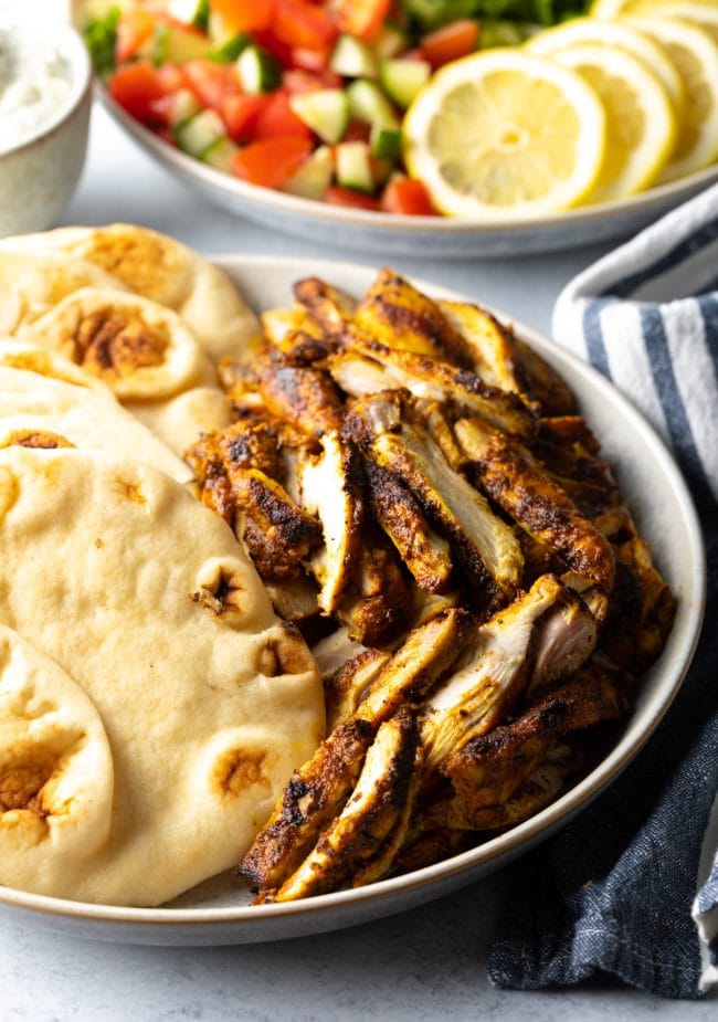 Unassembled chicken shawarmas. 