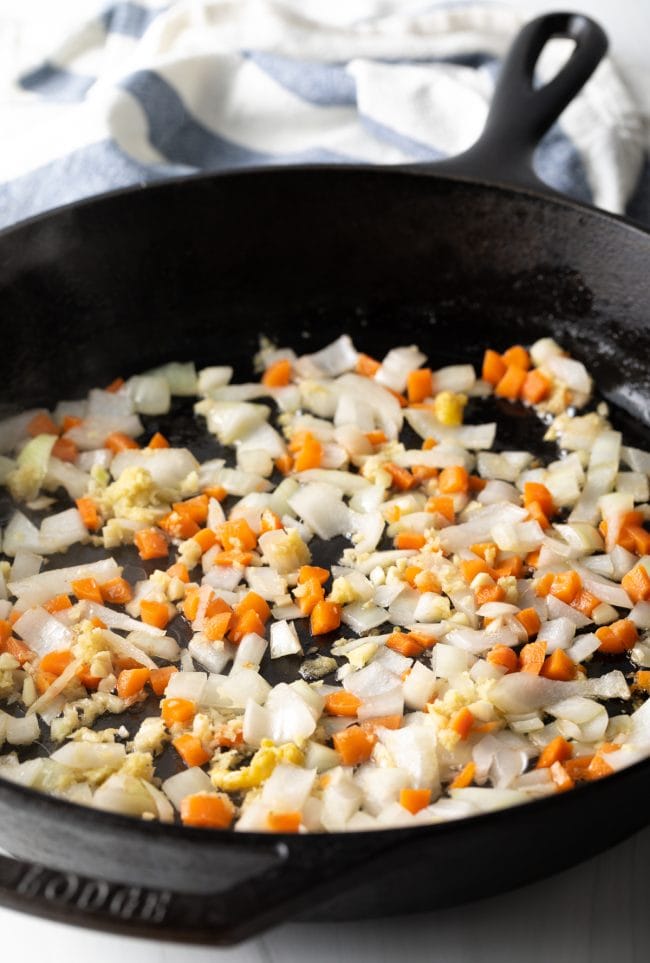 Vegetables being sauteed.