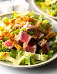 close view seared ahi tuna salad with lime aioli and crispy wontons