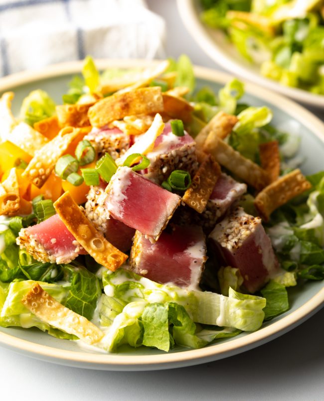 close view seared ahi tuna salad with lime aioli and crispy wontons