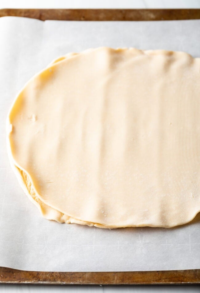 Two layers of pie crust on top of one another.