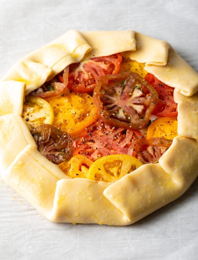 Tomato pie with crust edges folded.