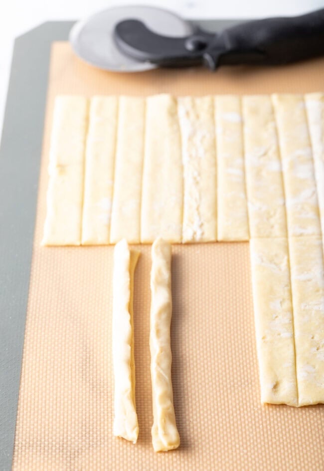 Puff pastry slivers folded into thicker pieces. 