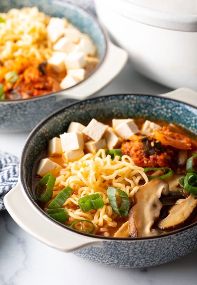 Close view spicy vegan ramen bowl.