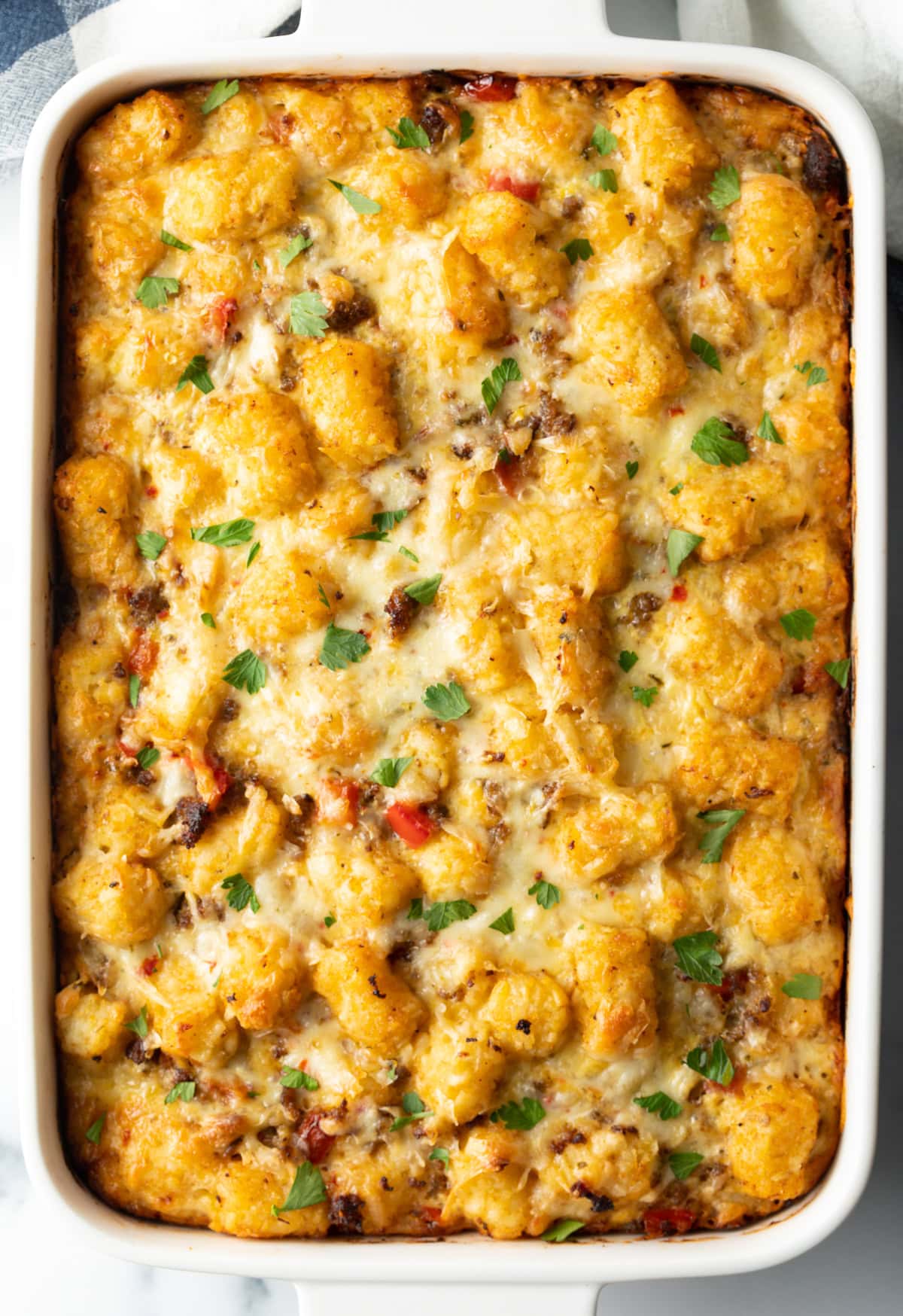 Top down view tater tot casserole from the oven.