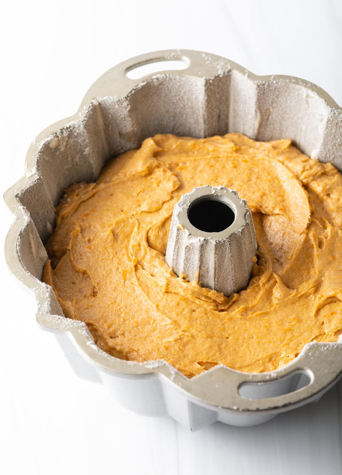 Cake batter in a Bundt pan.