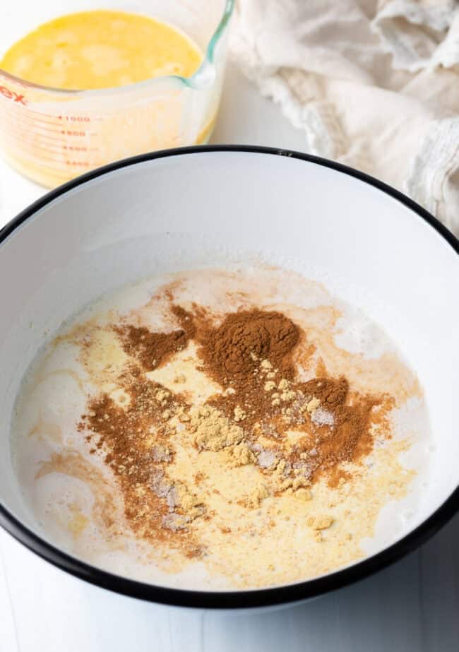 Large bowl with half and half, eggs, sugar, vanilla, and spices.
