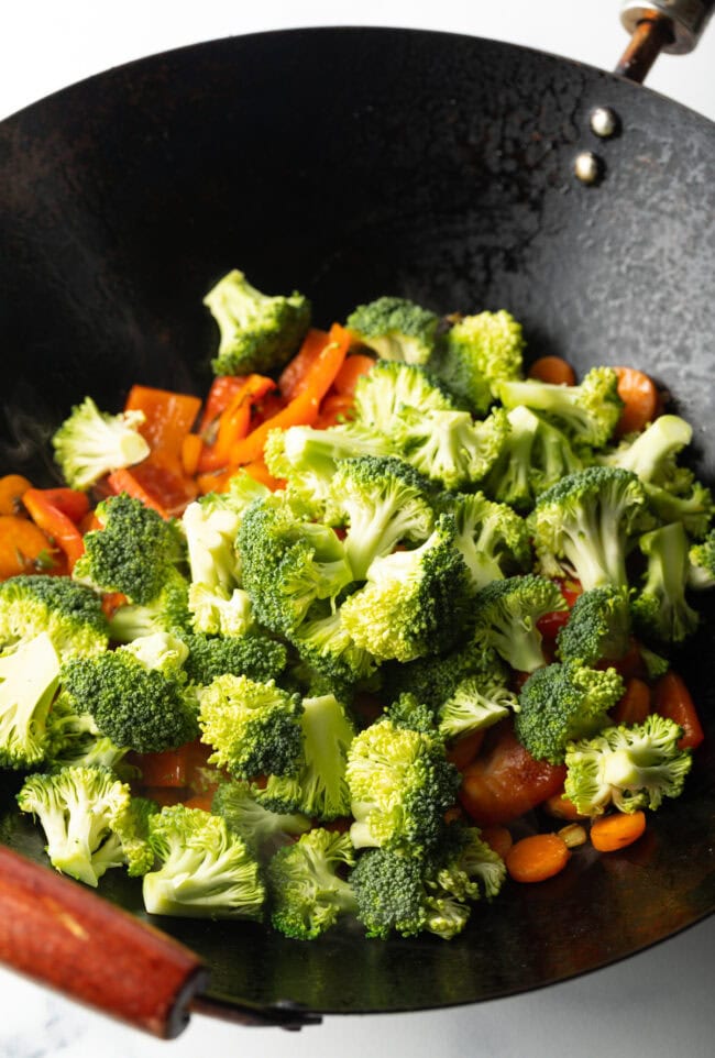 Chopped veggies tossed into large skillet.