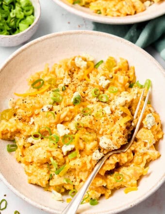 Buffalo Chicken Casserole Recipe with rice on bowls with fork