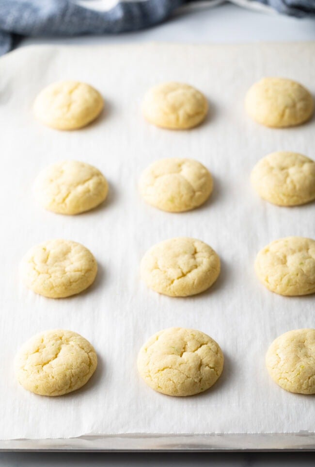 Baked soft cookies on parchment.