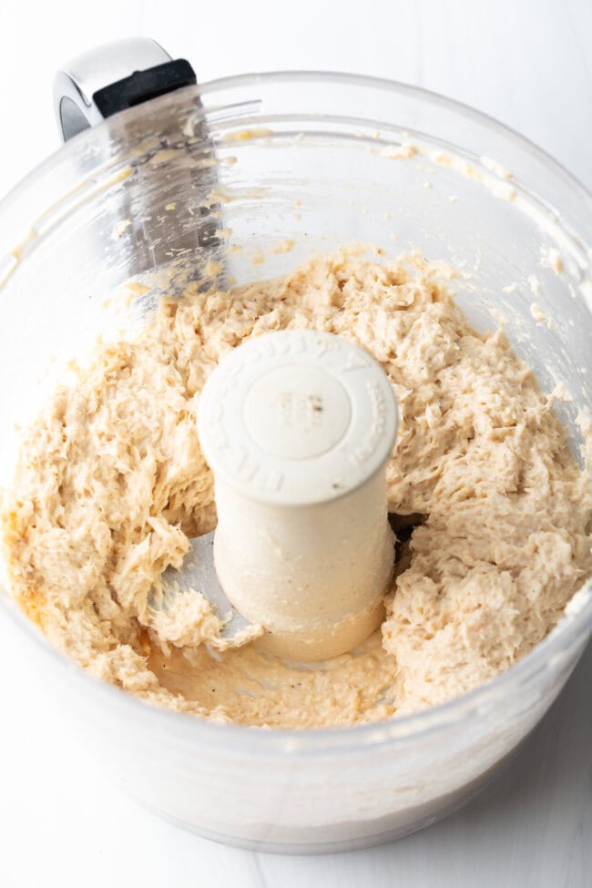 Blended fish dip in a food processor.