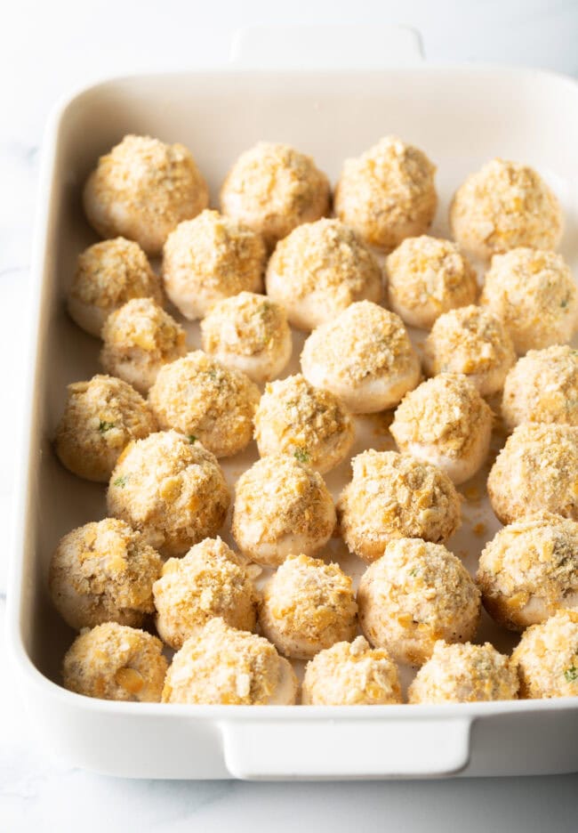 Breaded seafood stuffed mushrooms with ritz crackers - ready to bake.
