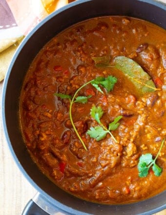 pumpkin chili recipe in large pot, overhead shot