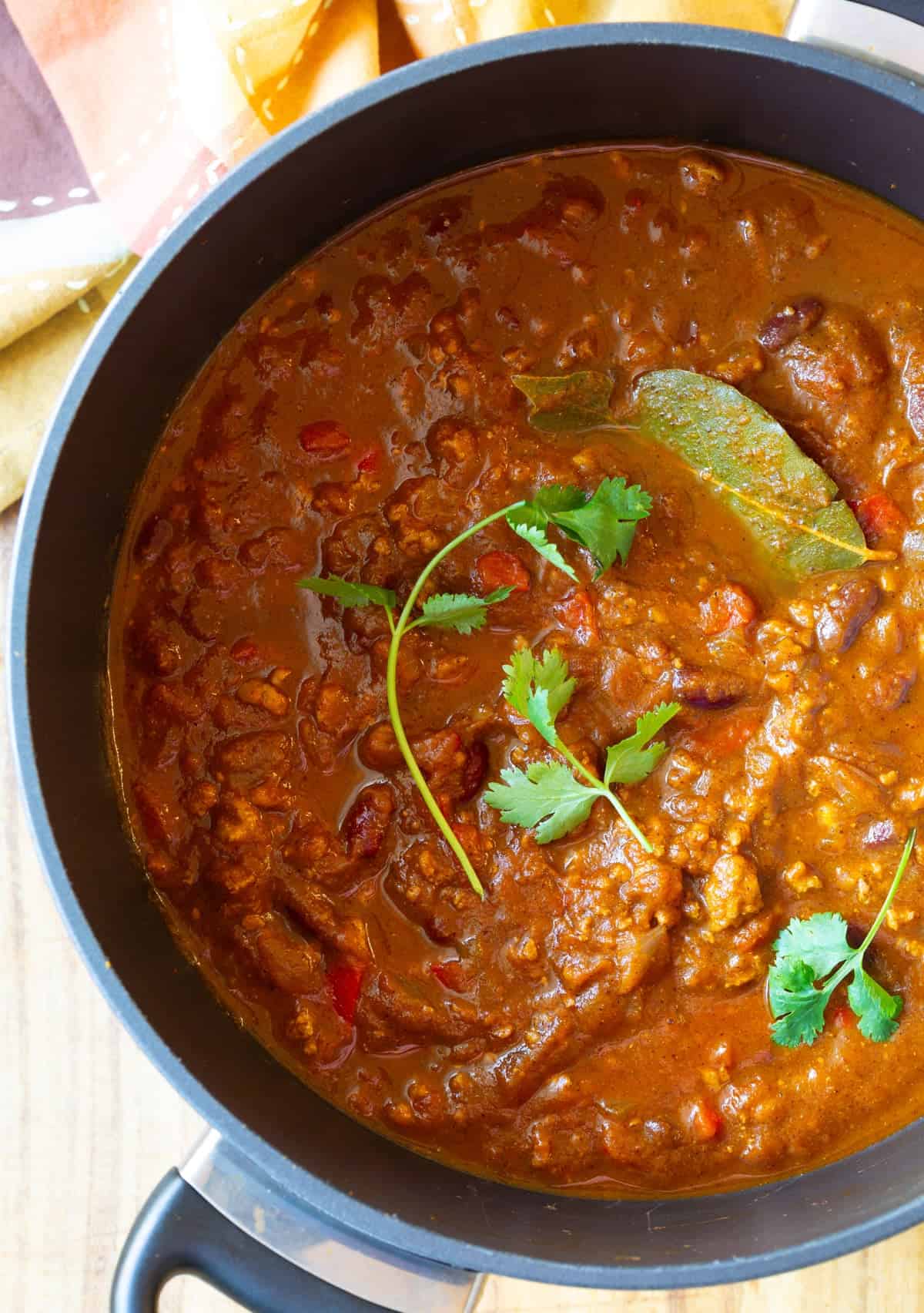 pumpkin chili recipe in large pot, overhead shot