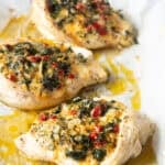 Spinach Stuffed Chicken Breast Recipe on baking sheet after baking