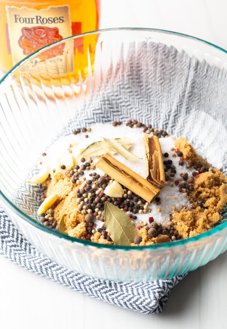 Glass bowl with spices, salt, and sugar.