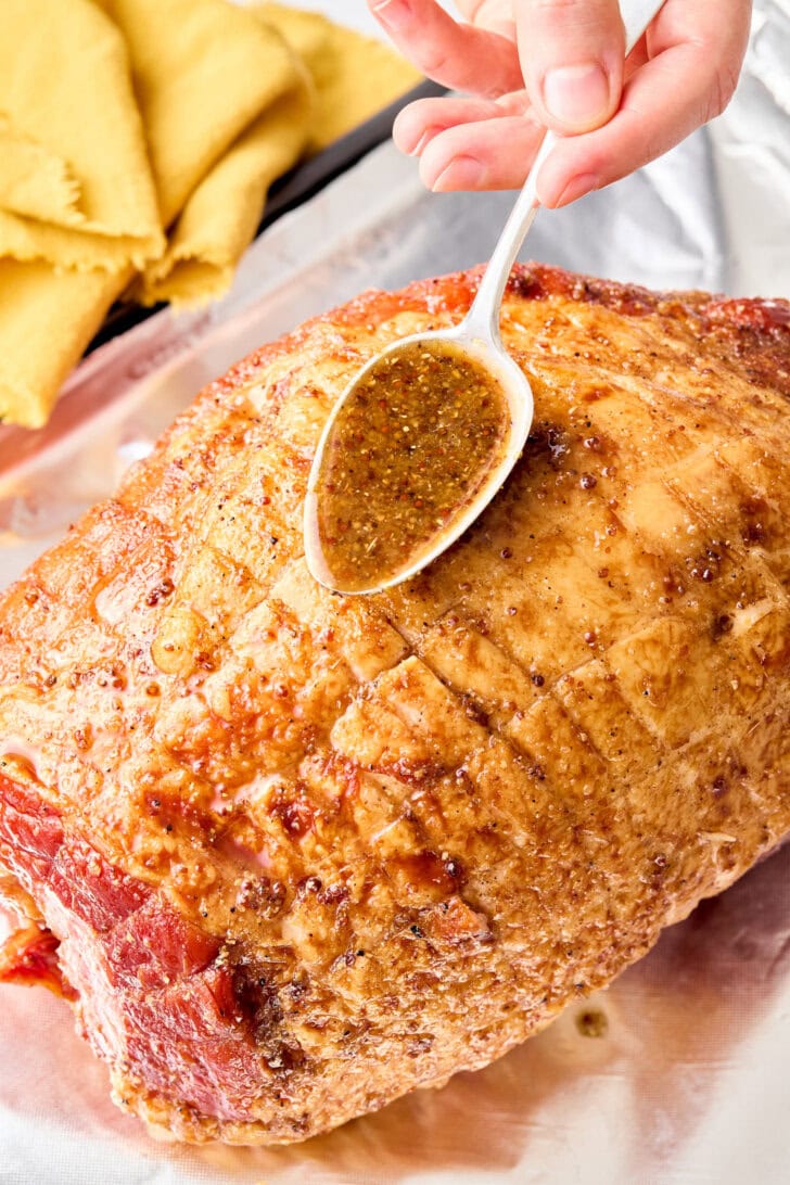 Glazed Ham with Brown Sugar - placing glaze on ham